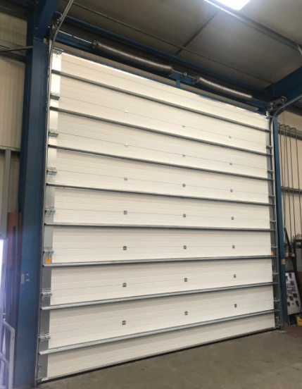 Hochsicherheits-Schloss-Feuerwehr-Industrie-Sektionaltore mit automatischen geformten und Notentriegelungs-Feuerschutz-Rolltor-Exporteuren